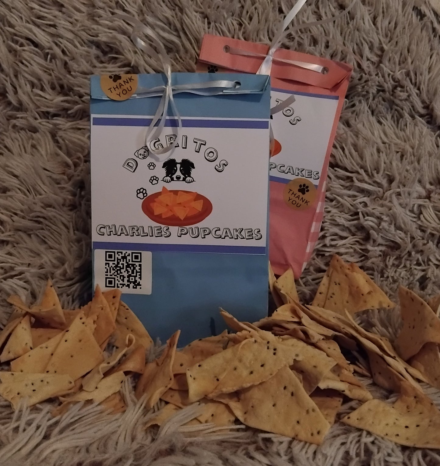 Sit back on the couch and watch your favourite movie with your favourite 4 legged friend and rip open a packet of movie night "Dogritos" . made with beef stock , chai and sesame seeds pup is going to love this crunchy treat .