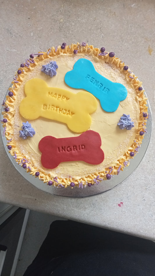 20 cm round cake with bone decoration your choice of decoration and personalised text