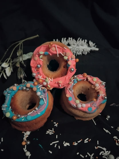 DOGGY DO-NUTS      so popular , soft and doggylicious , made with bananas, honey and peanut putter , toppings of dog friendly cream cheese mix with a sprinkling of fairy dust !  perfect for older doggos or those who are teeth deprived
